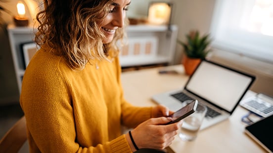 Woman exchanges data securely with Tresorit Woman exchanges data securely with Tresorit